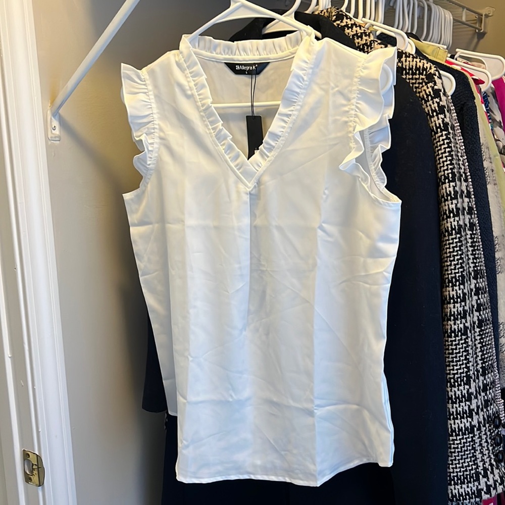 Never worn, doesn’t fit the way I needed it to for a specific outfit. From Belk